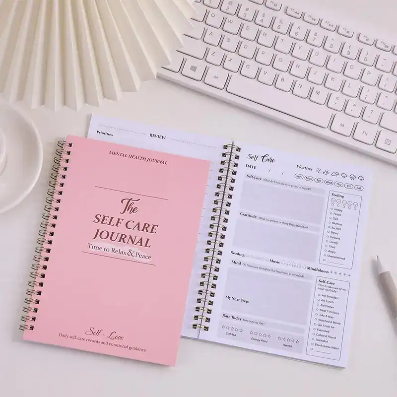 Structured self‑care journal promoting calm reflection and emotional well‑being.
